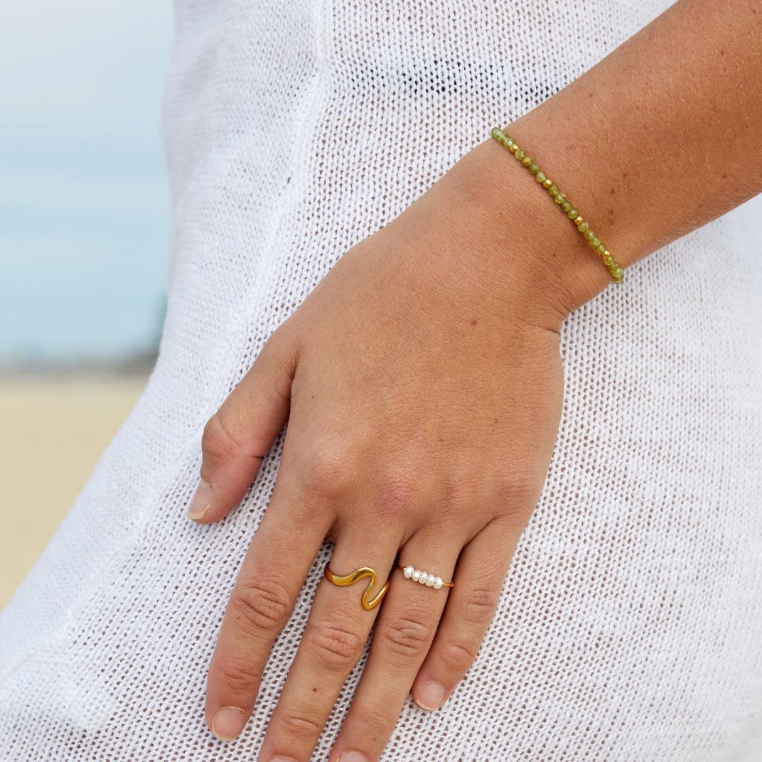Bague fine or perle charme