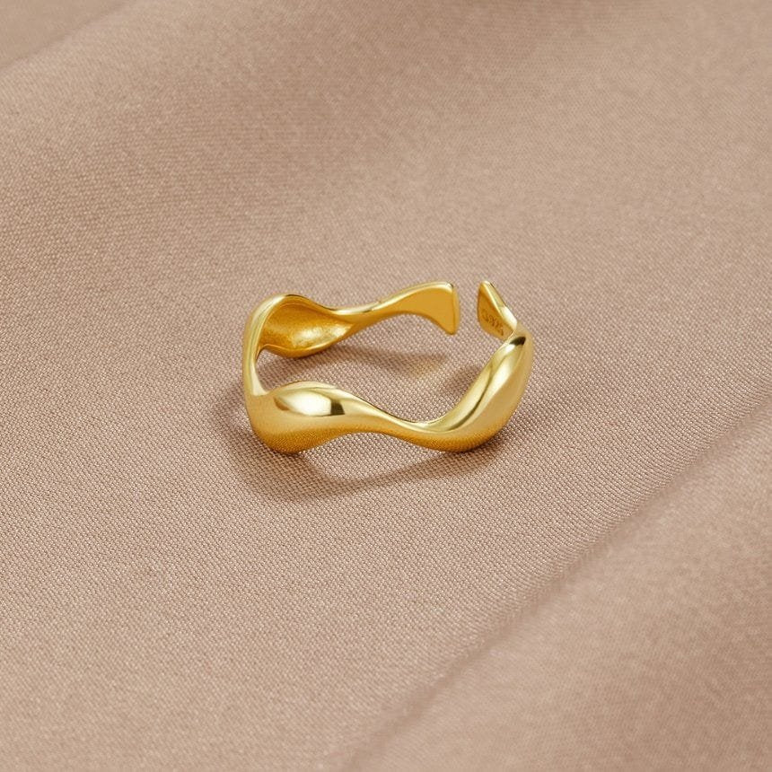 Bague vague dorée élégante soleil