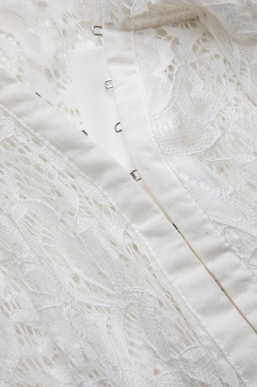 Blouse dentelle blanche vue de dos fleur