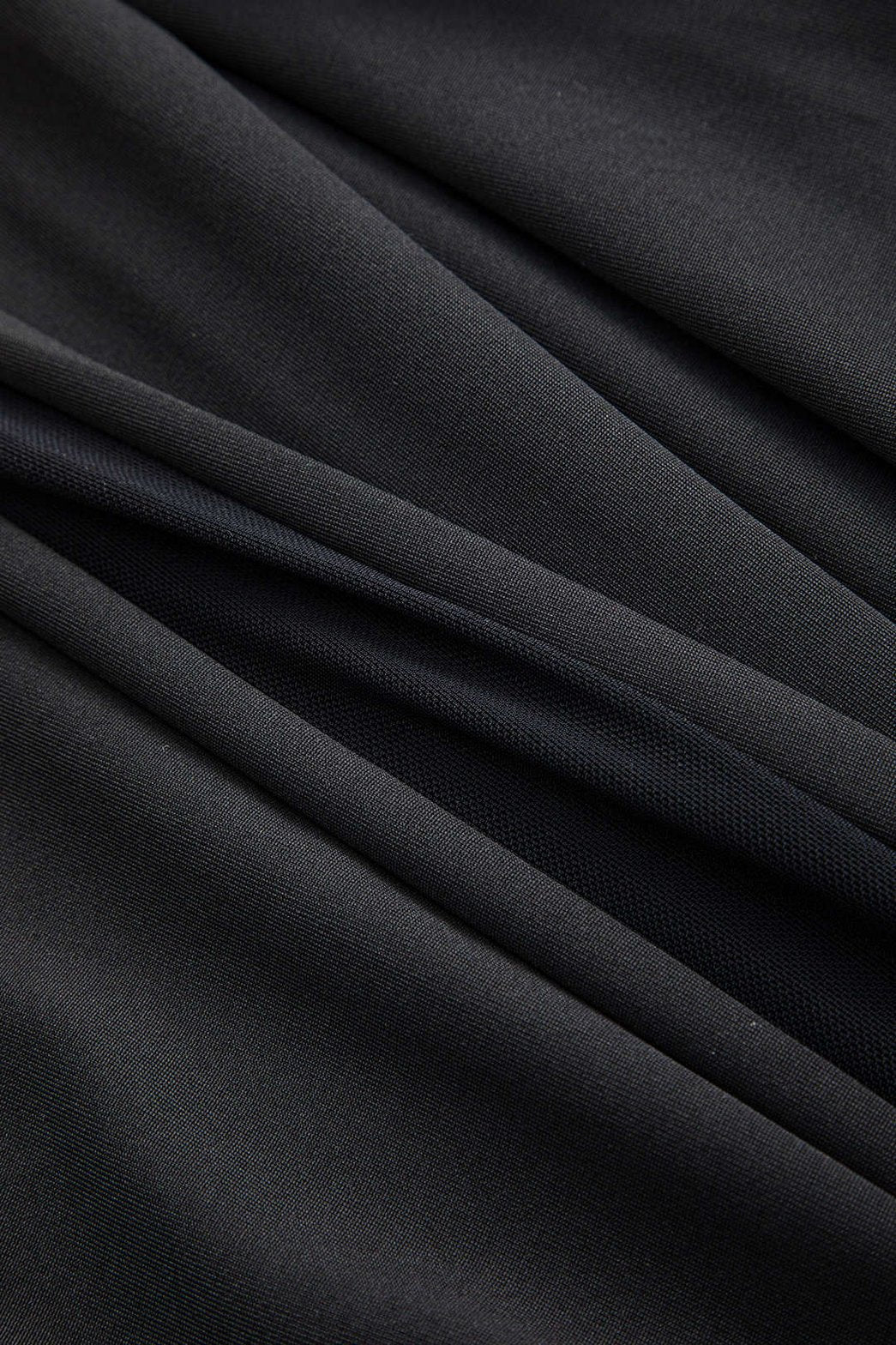 Body noir patchwork élégant détail maille vent