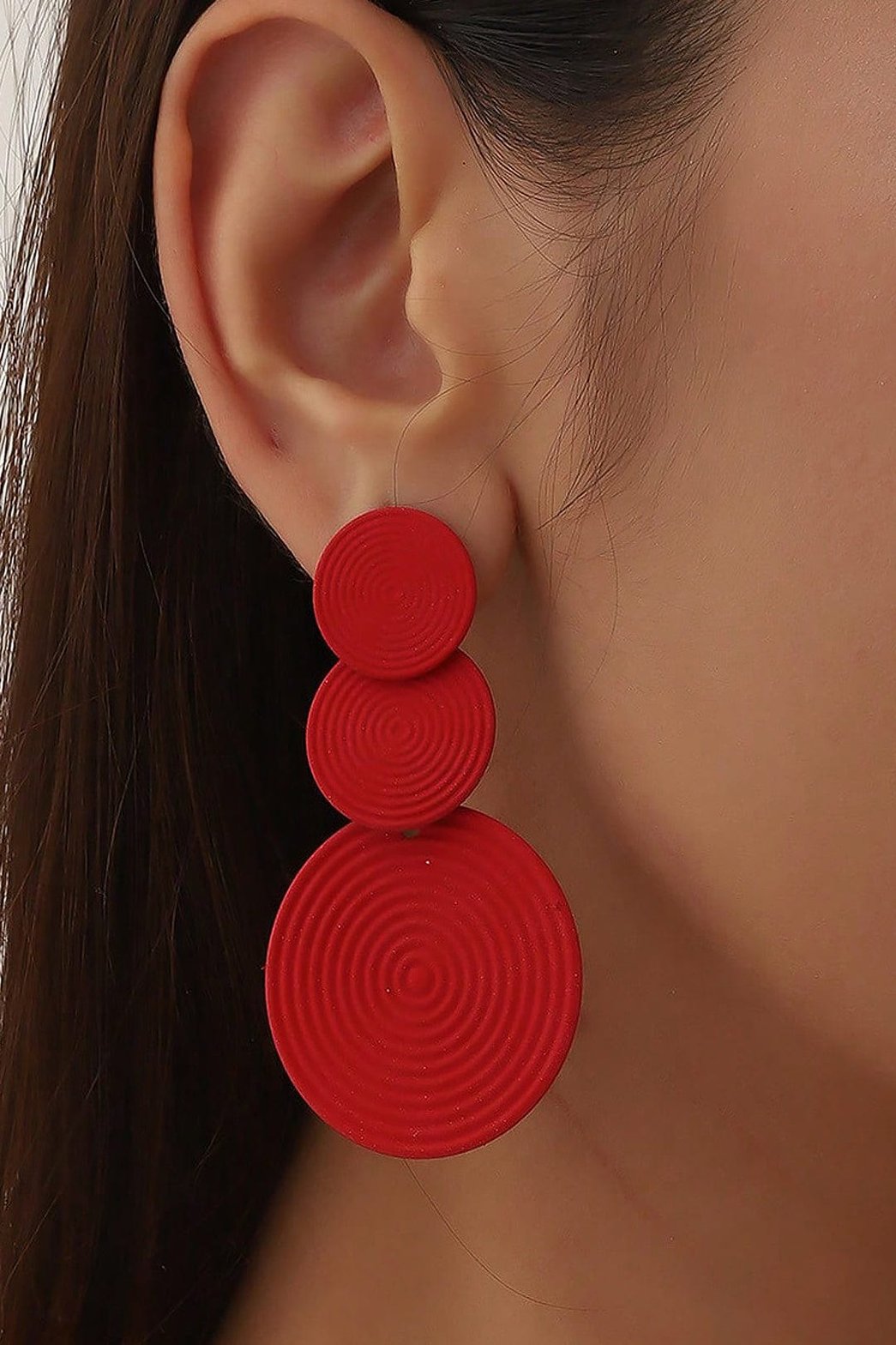 Boucles d'oreilles cercles rouges superposés étoile