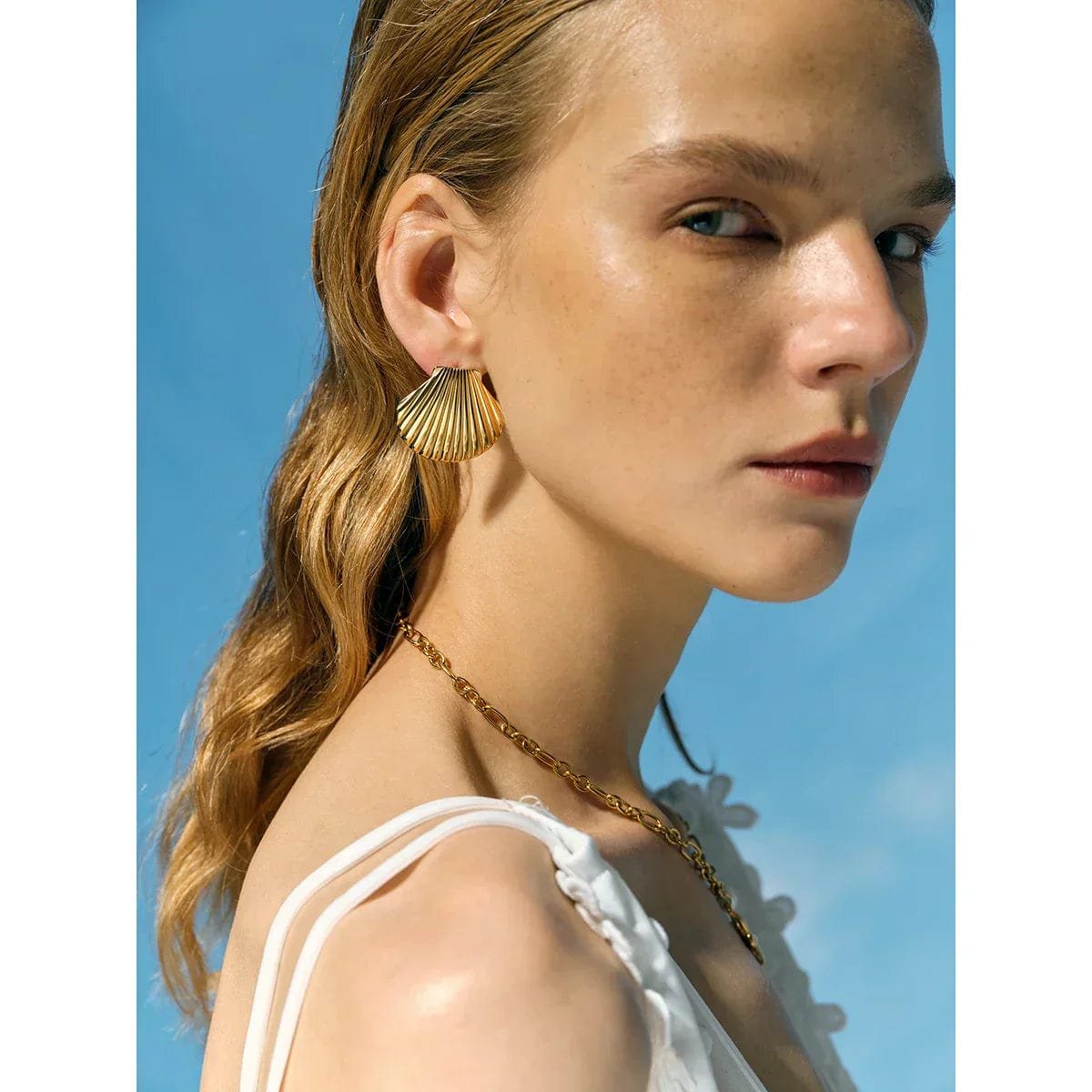 Clous d'oreilles coquillage écume