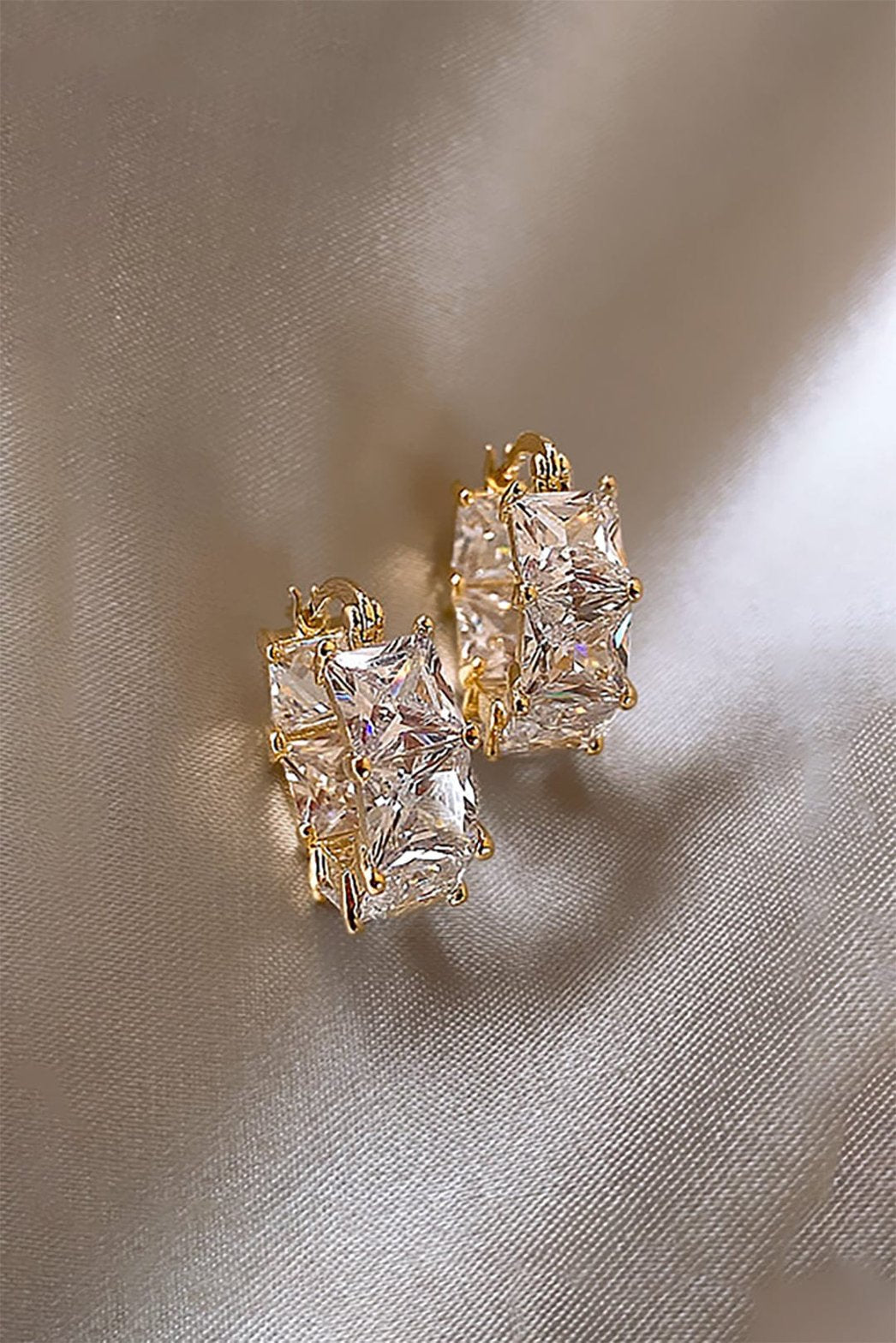 Boucles d'oreilles cristal dorées étincelantes soleil