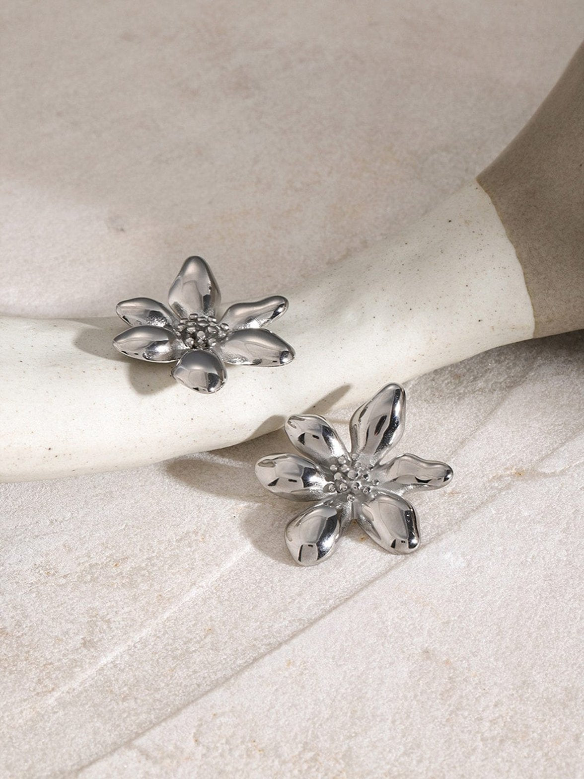 Boucle d'oreille fleur luxueuse océan