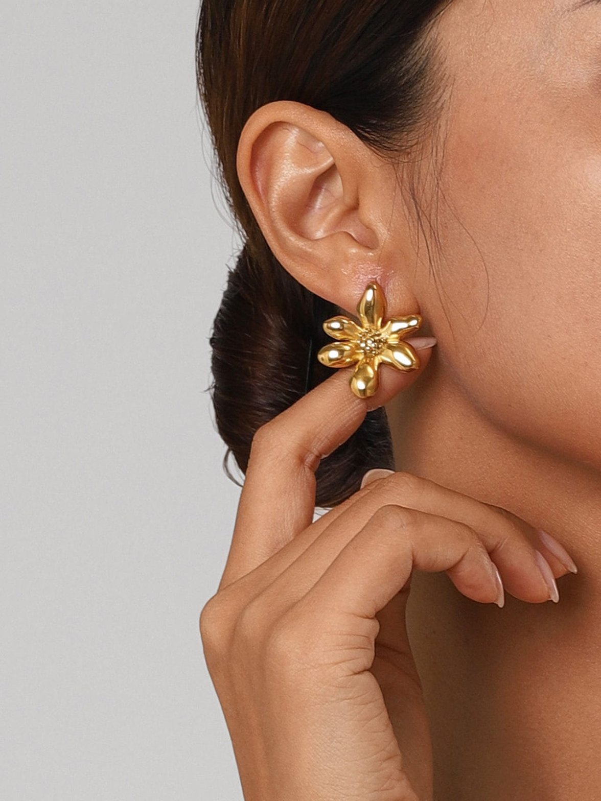 Boucle d'oreille design pétales or rose