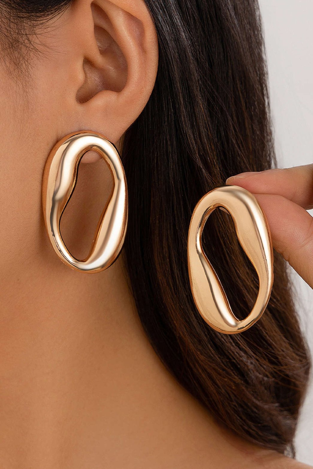 Boucles d'oreilles ovales dorées élégantes soleil