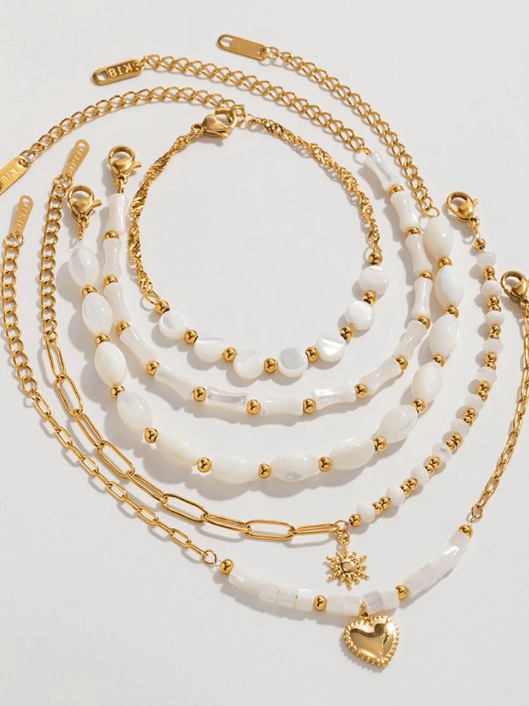 Bracelet doré avec coquillages naturels soleil