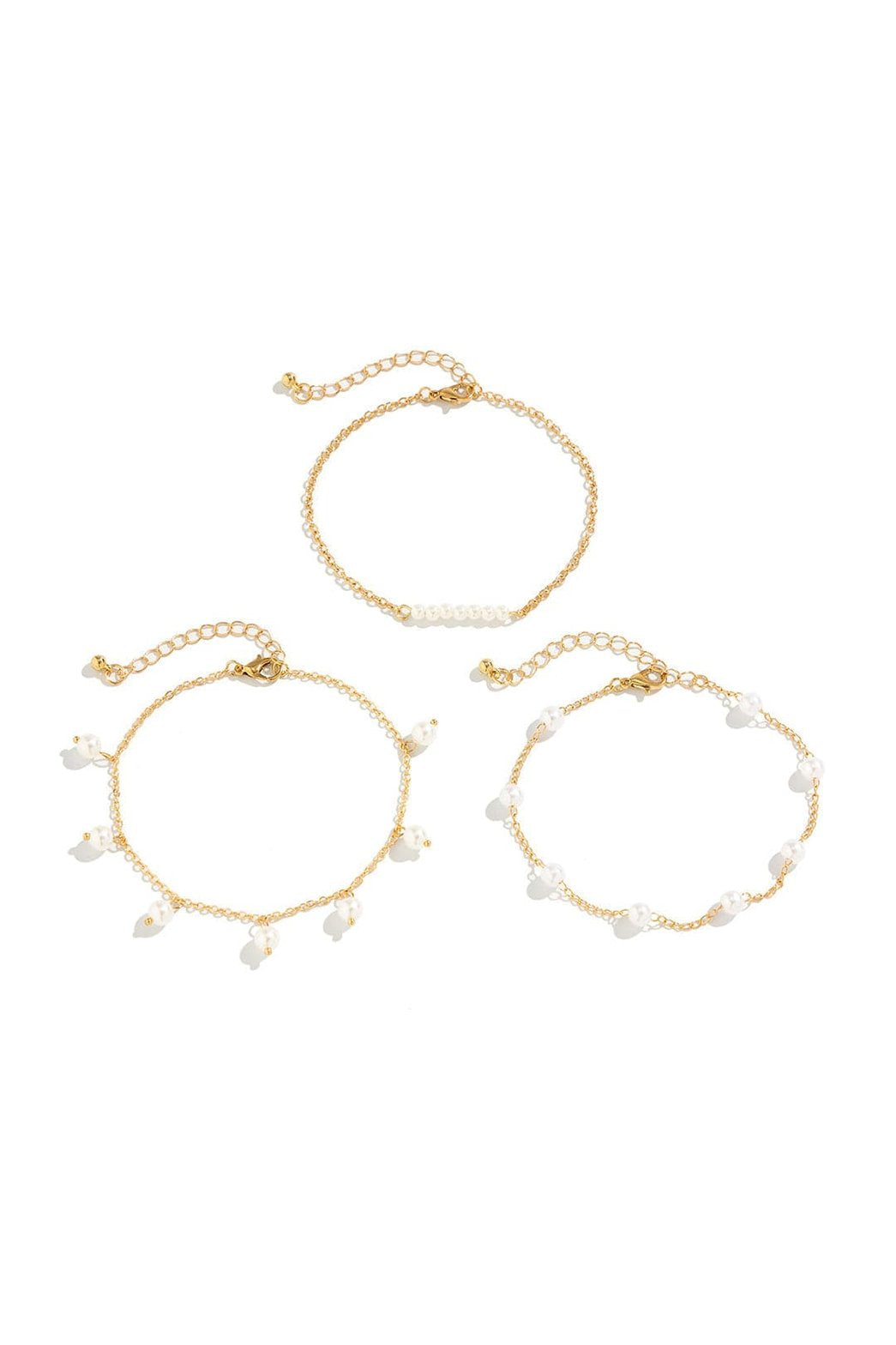 Bracelet de cheville doré avec perles délicates soleil