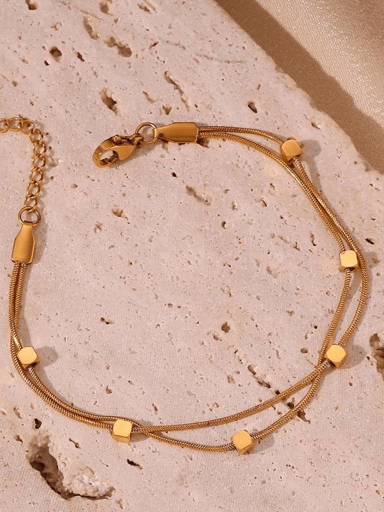 Bracelet double chaîne or détail harmonie