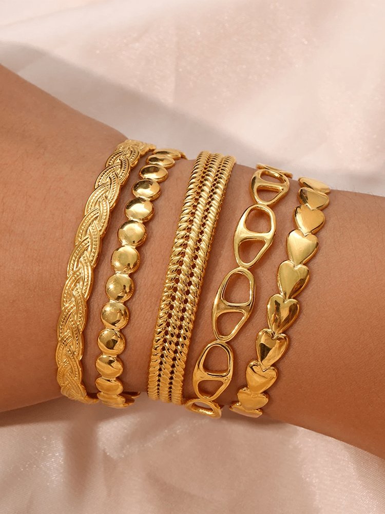 Bracelet jonc doré design tressé soleil