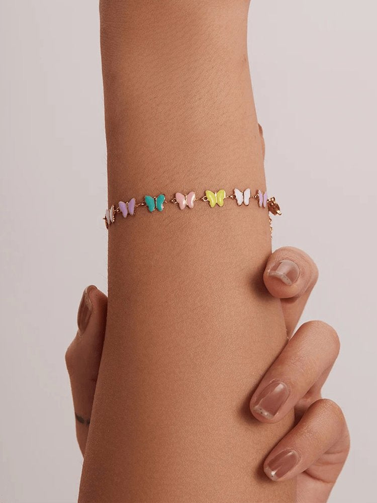Bracelet papillon coloré vue de face doux