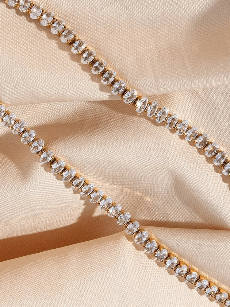 Bracelet tennis plaqué or détail serein