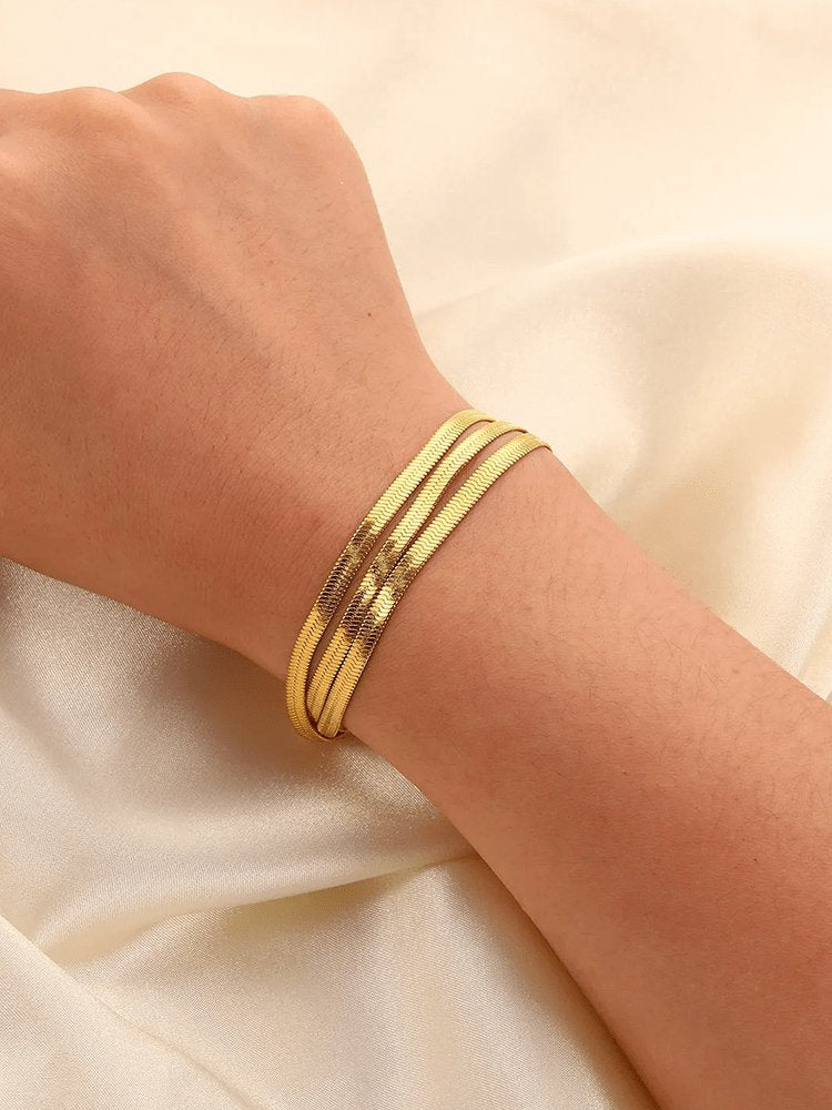 Bracelet plaqué or détail charm