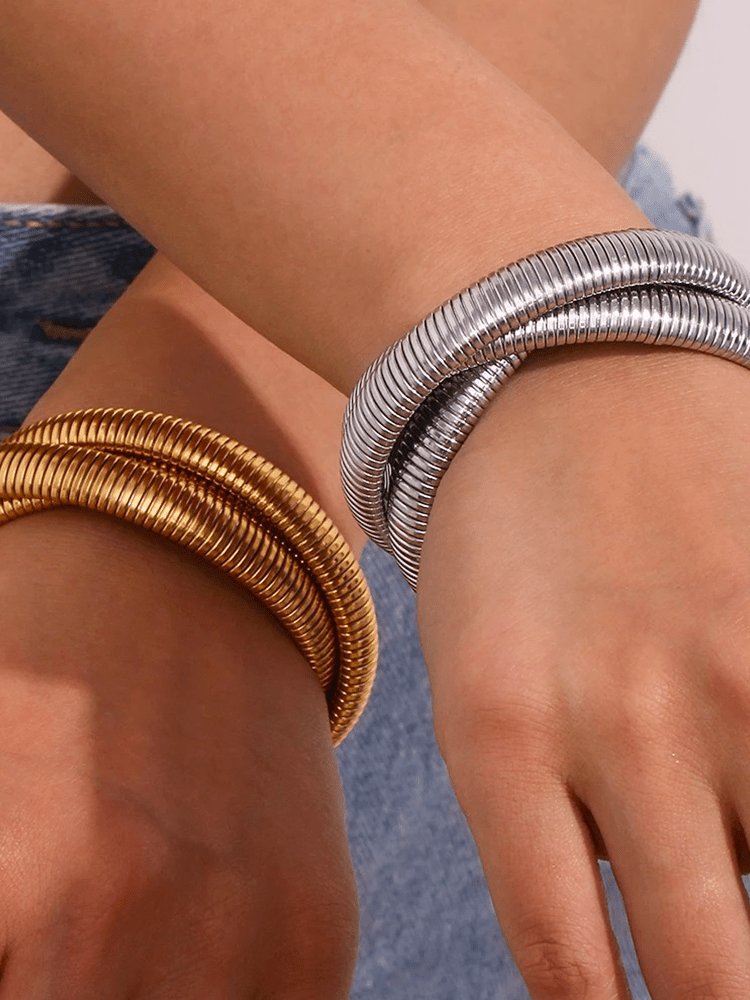 Bracelet serpentin or porté crystal