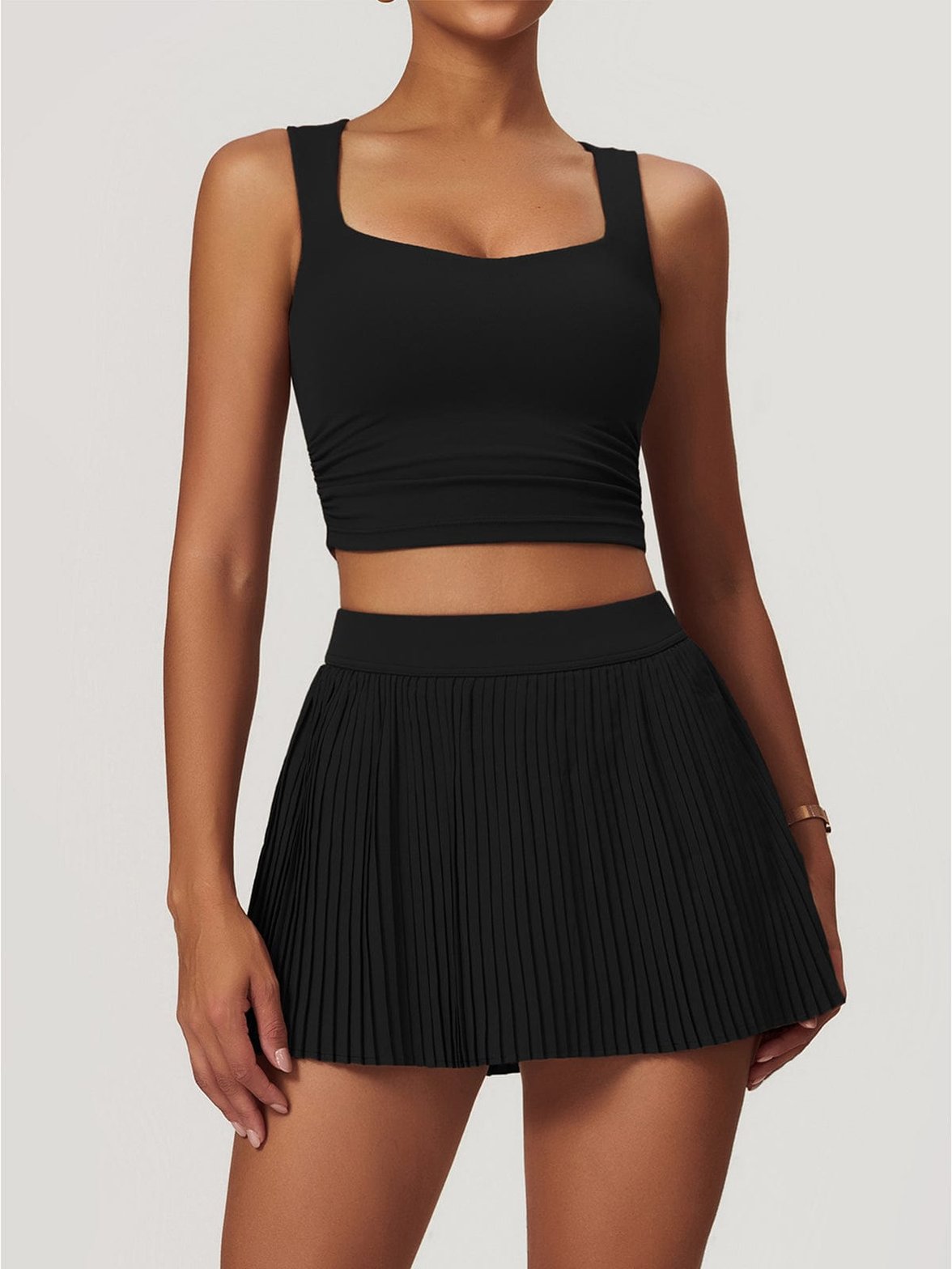 Top sport stretch noir soleil