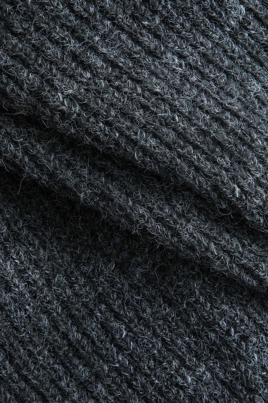 Cardigan asymétrique porté vue profil danse