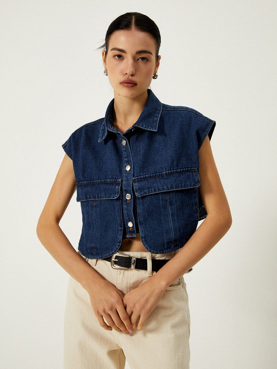 Détail boutons cardigan denim pluie