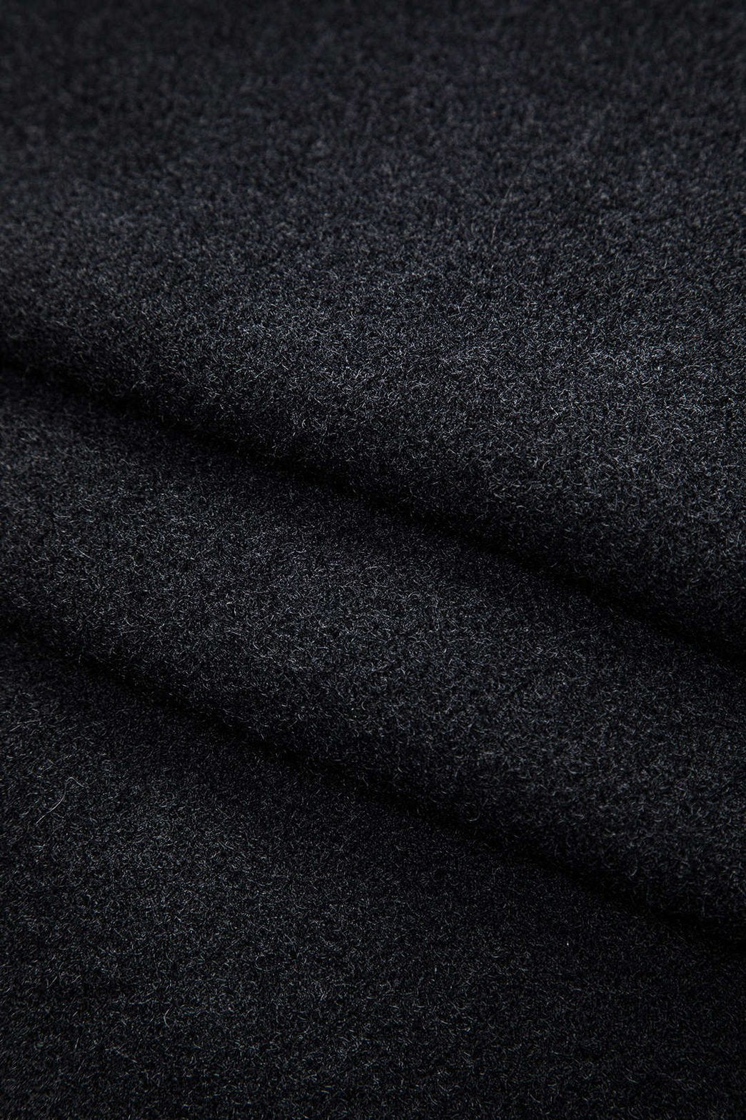 Détail des boutons du cardigan nuage