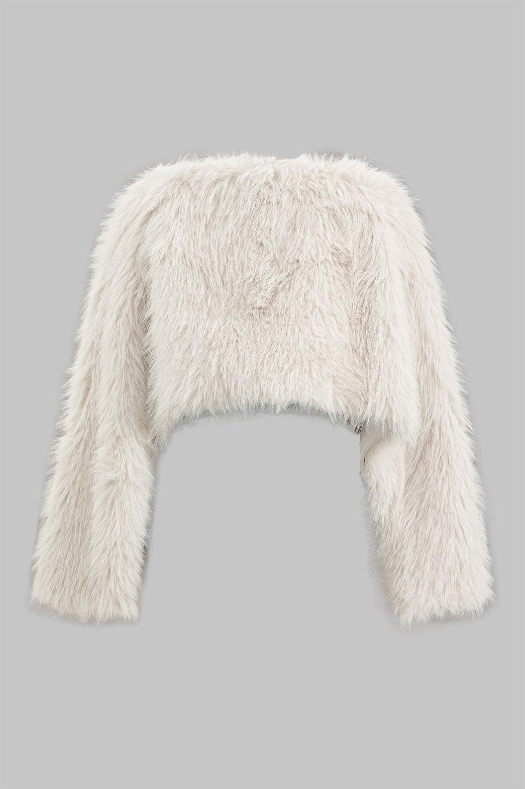 Chemise blanche doudou en fausse fourrure vue de dos neige