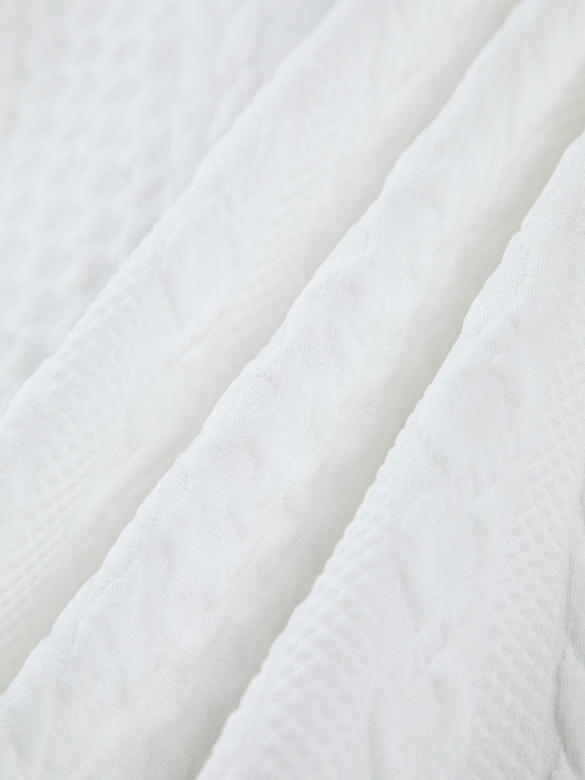 Chemise tricotée blanche détail tissu légèreté