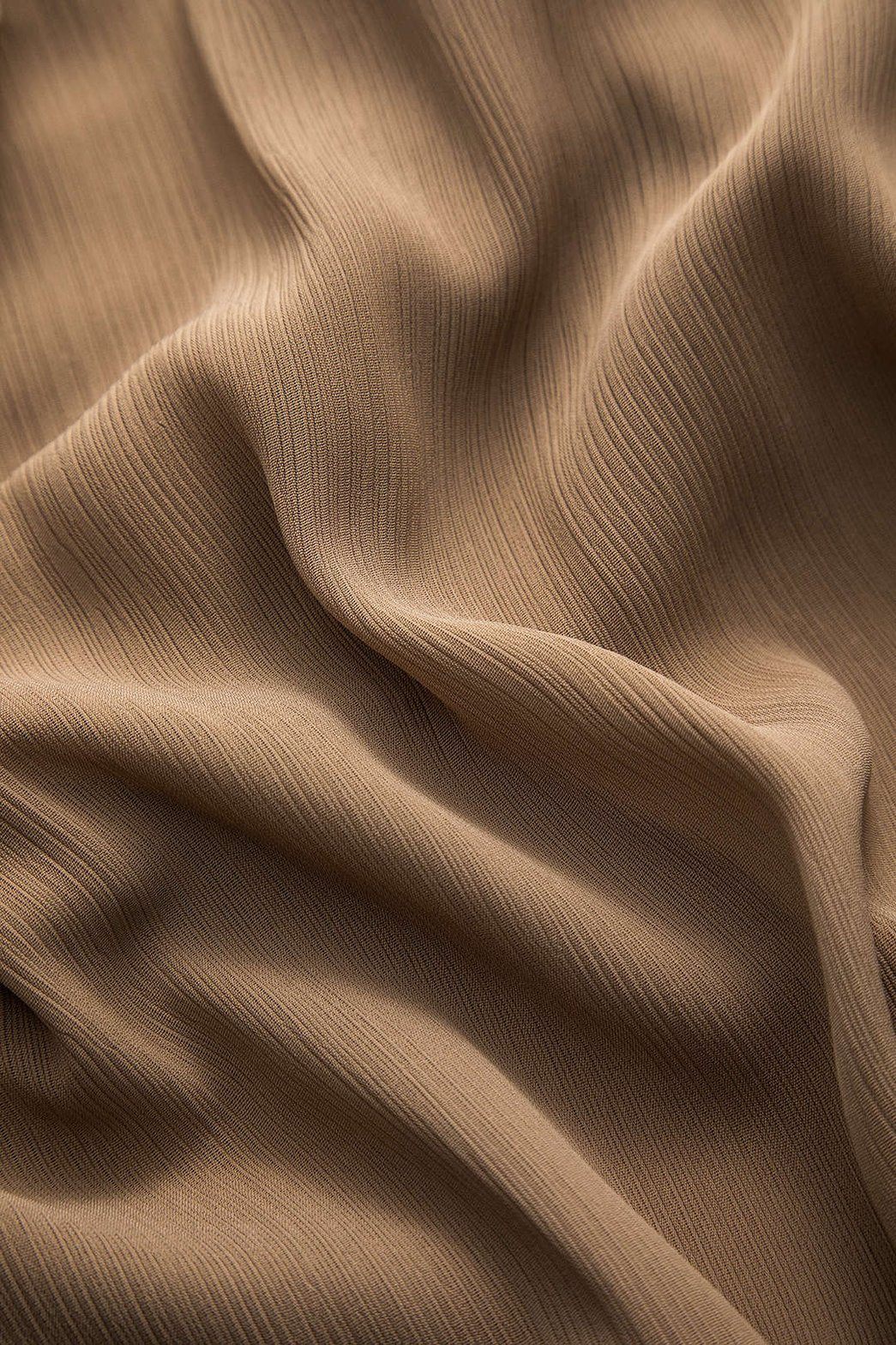 Chemisier plissé beige vue dos grâce