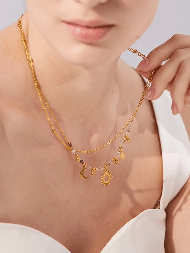 Collier céleste avec breloques soleil et lune doré zéphyr