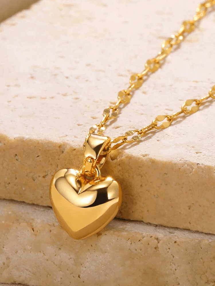 Collier pendentif cœur doré grâce
