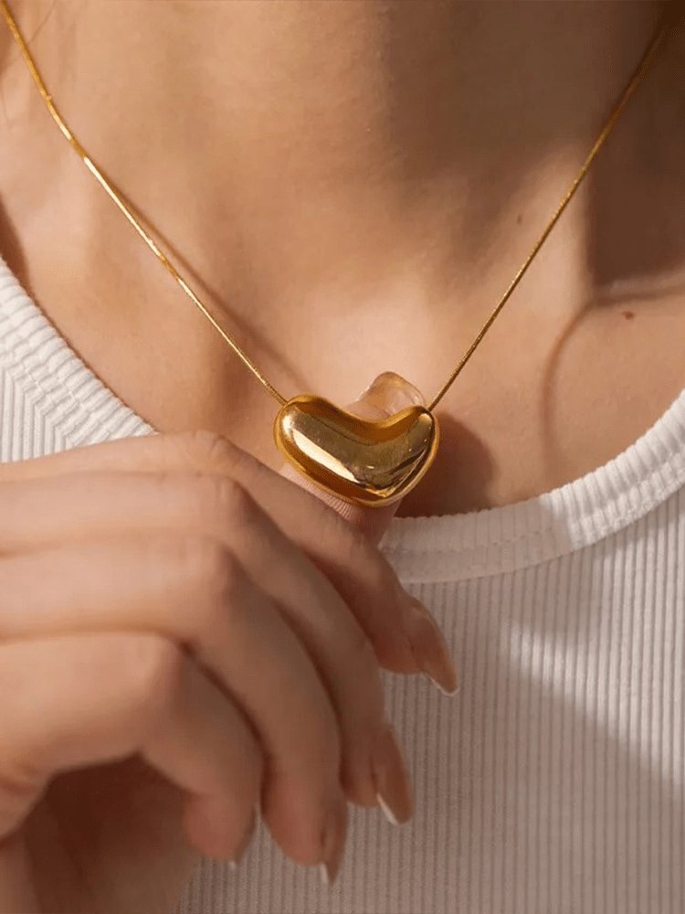 Collier serpent doré avec pendentif cœur élégant harmonie