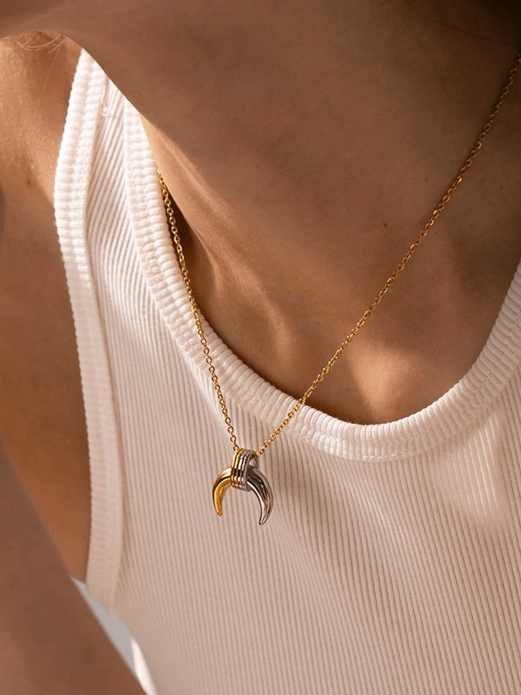 Vue complète collier croissant bicolore soleil