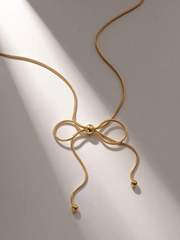 Collier nœud papillon style moderne douceur