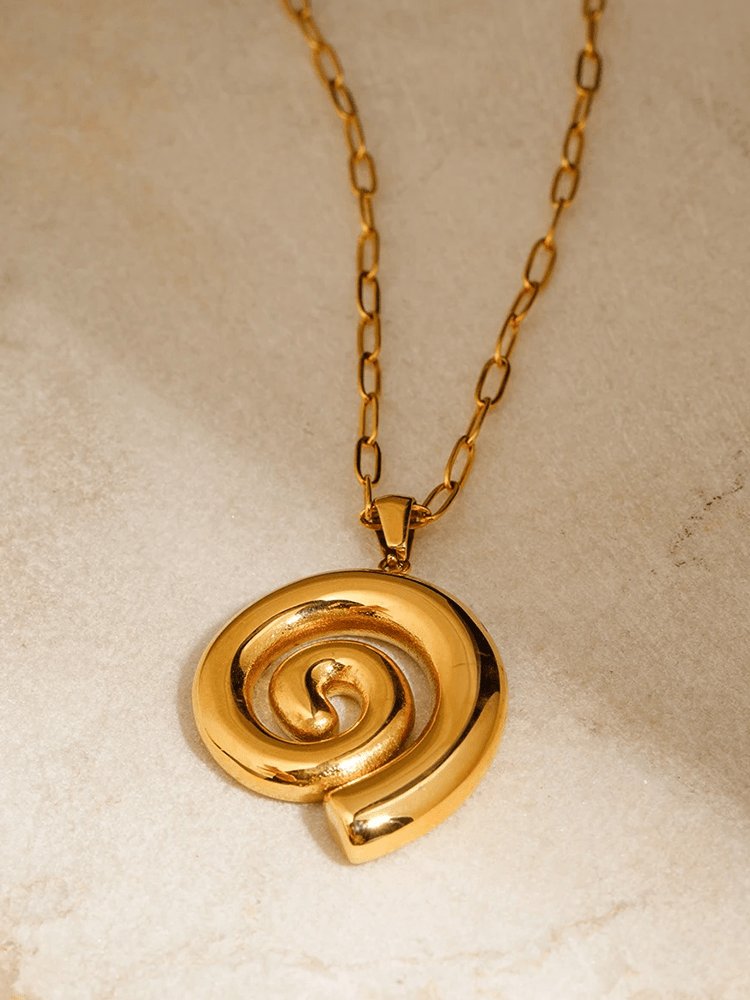 Collier spirale plaqué or vue face soleil