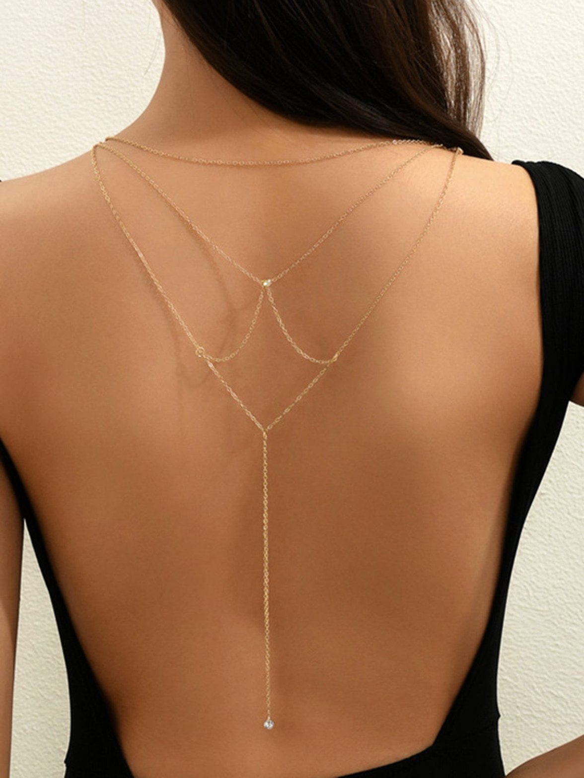 Collier dos nu strass or étincelant douceur