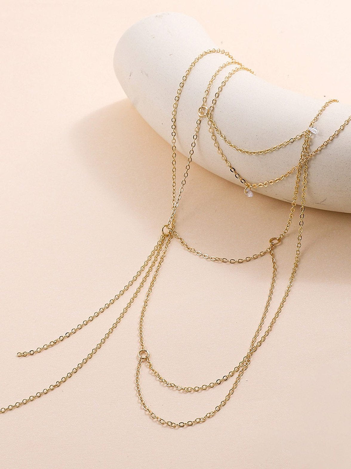 Collier dos nu strass or délicat grâce