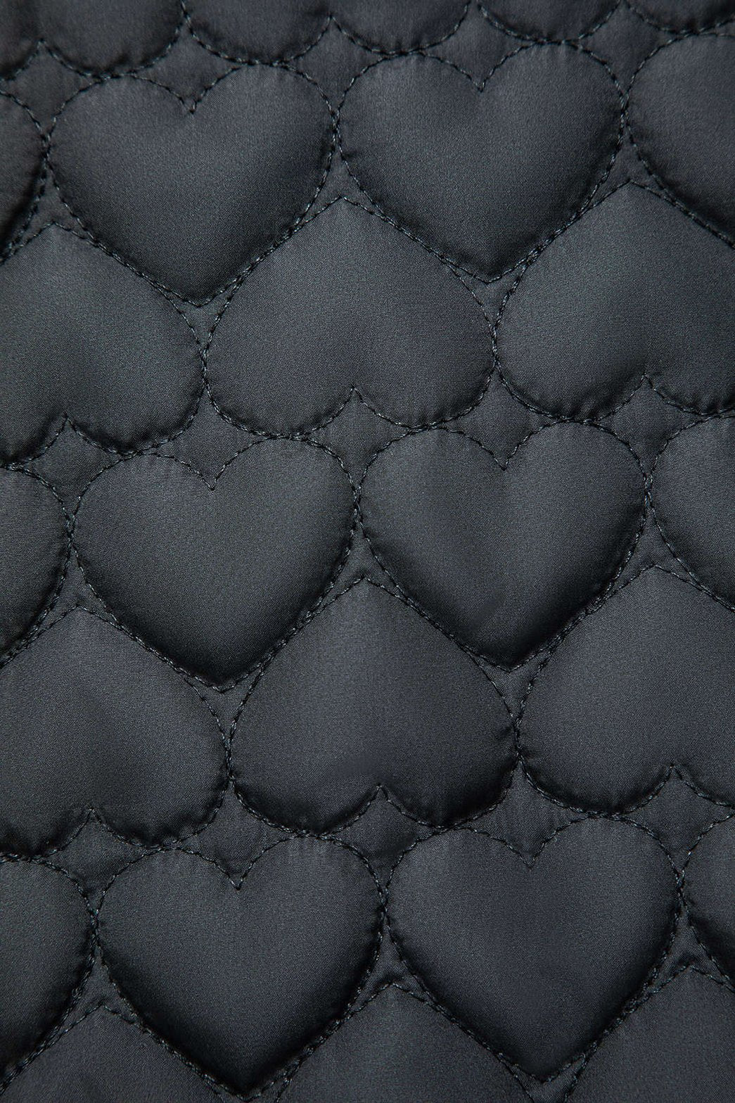 Détail poches doudoune noire ravissante