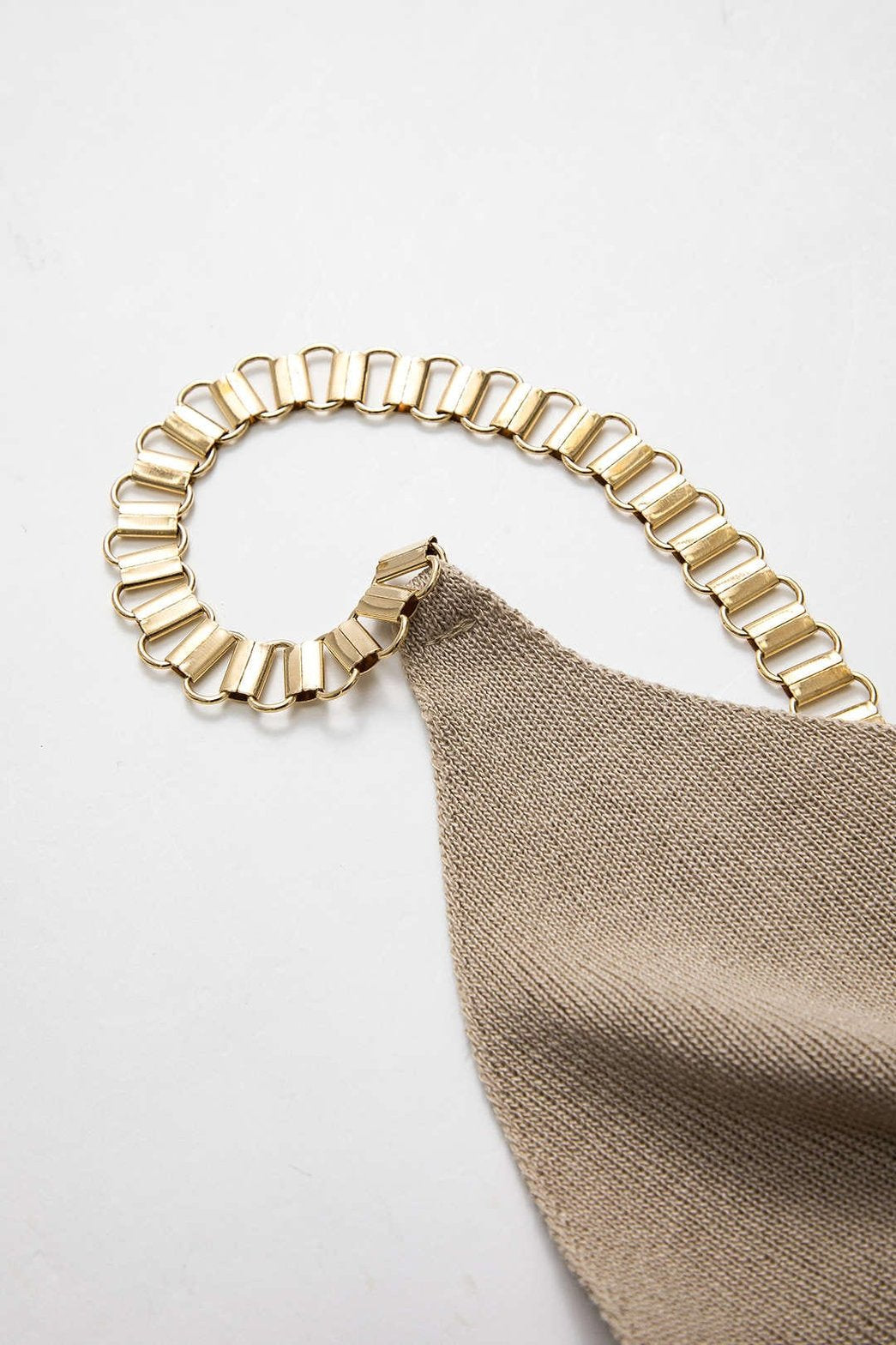 Détail matière métallisée beige perle