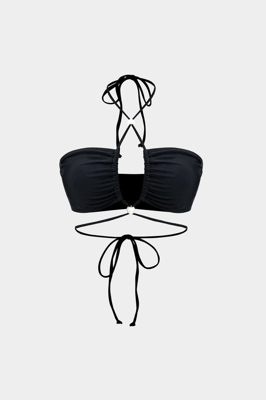 Vue de dos du bikini perlé avec robe plage