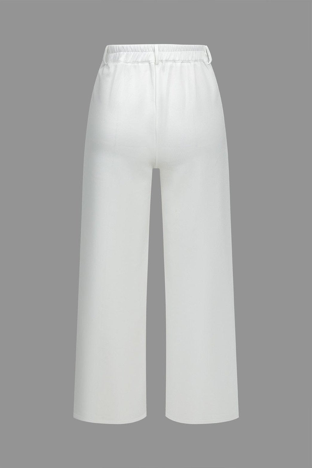 Ensemble pantalon et top blanc chic sérénité