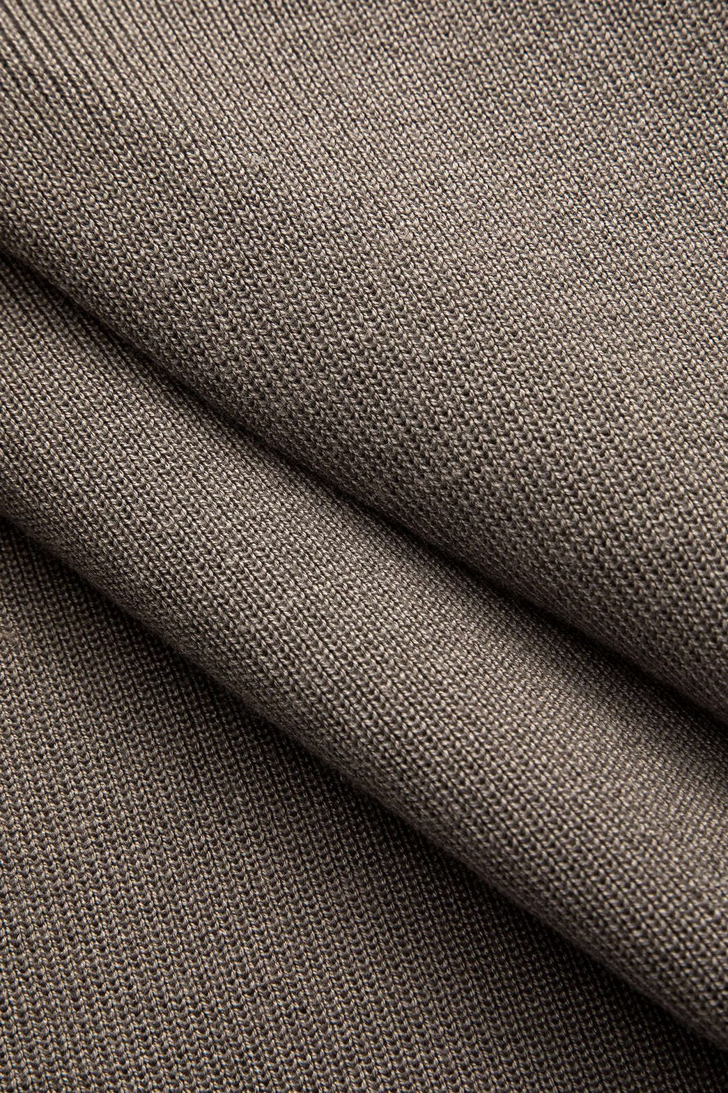 Ensemble tricot col roulé motif losanges bicolore vue dynamique énergie