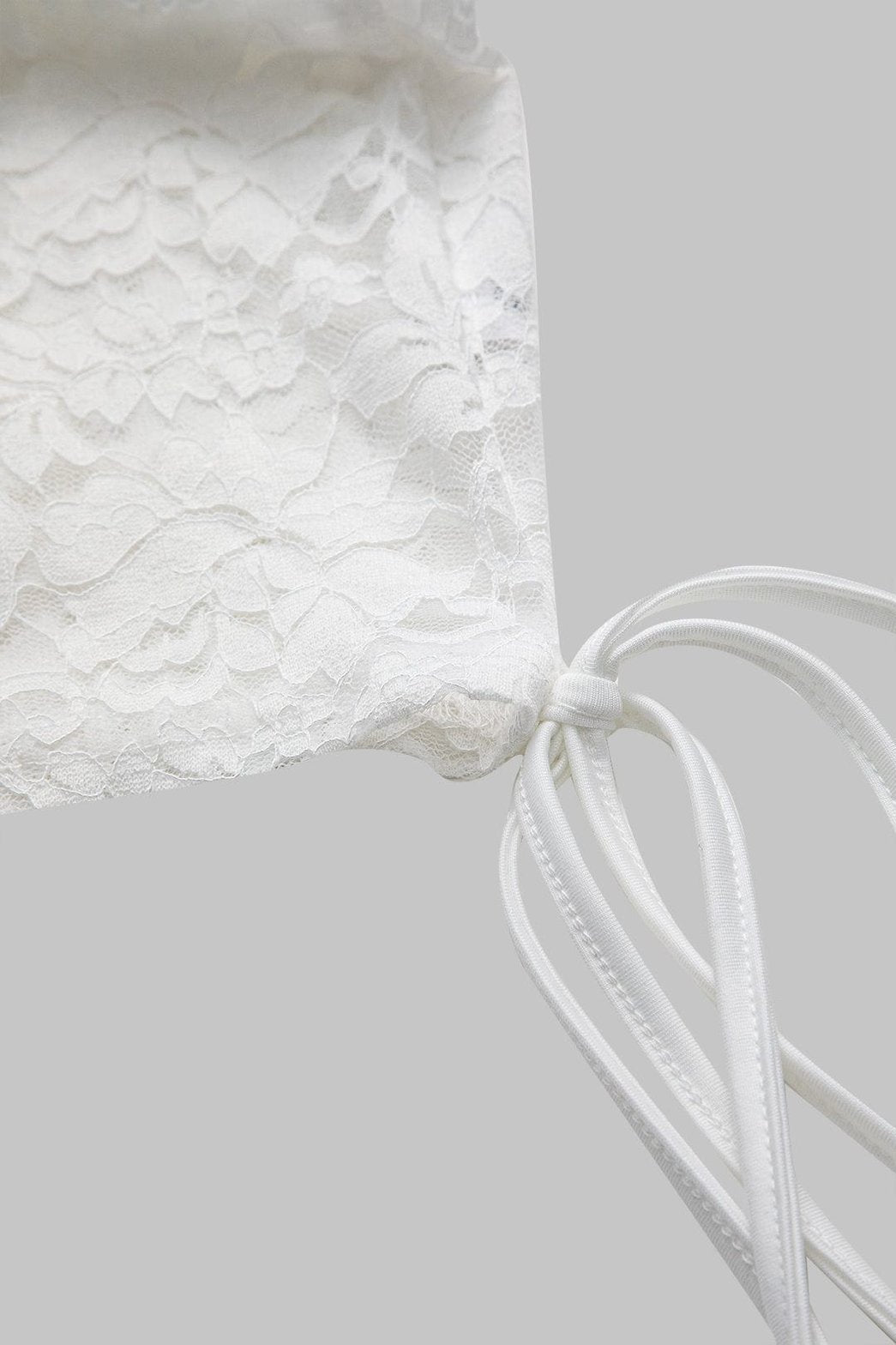 Ensemble dentelle blanc vue complète palmier