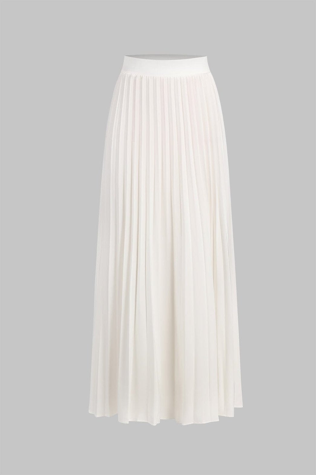 Détail jupe plissée blanche fluide grâce
