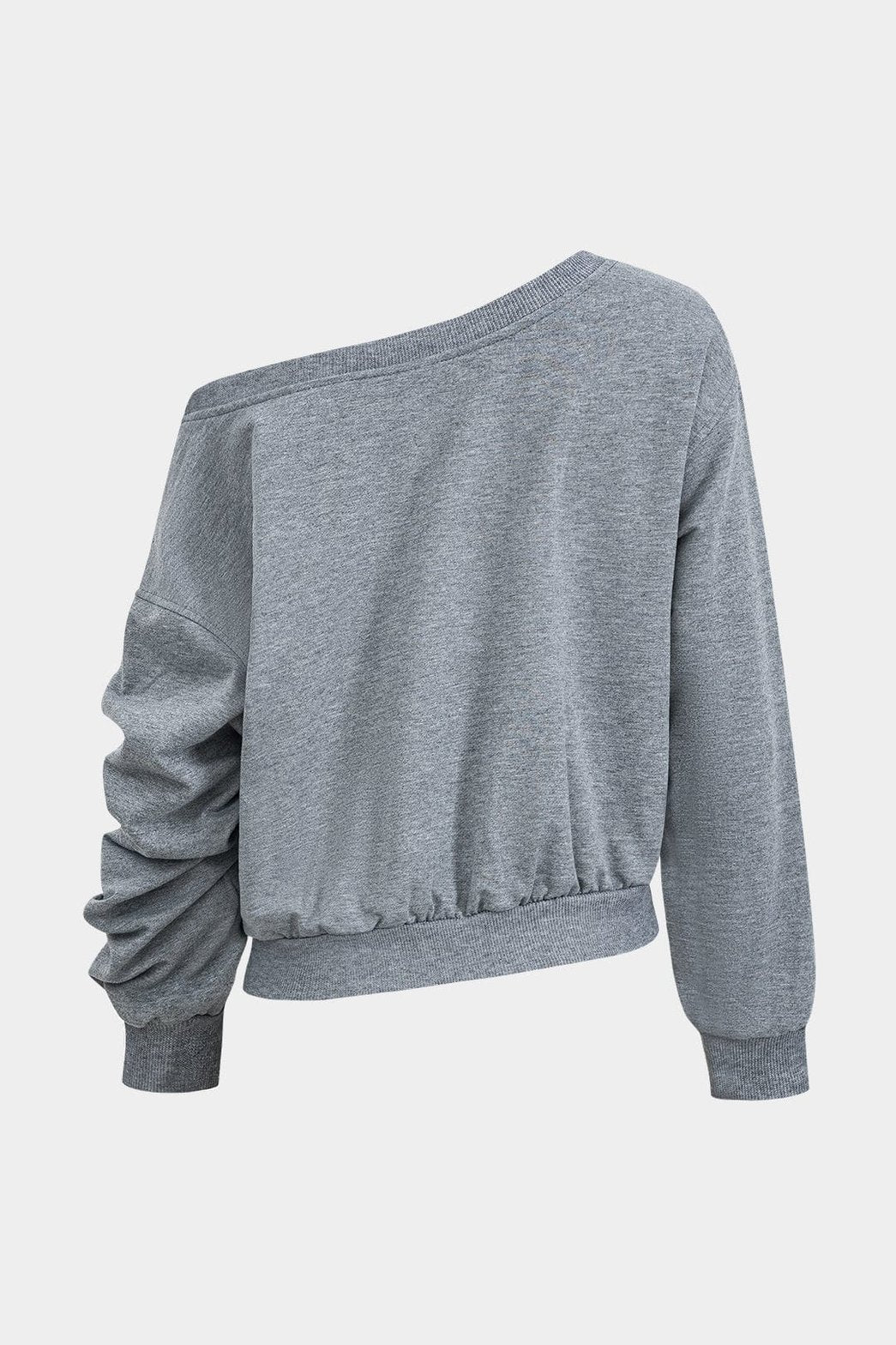 Ensemble gris asymétrique vue latérale élégance