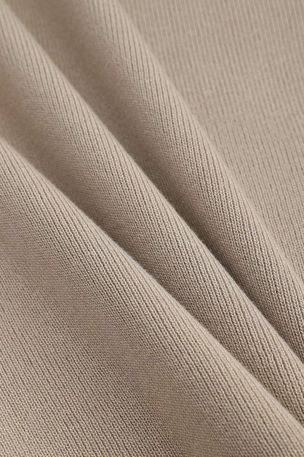 Ensemble cape et pantalon beige détail finition nature