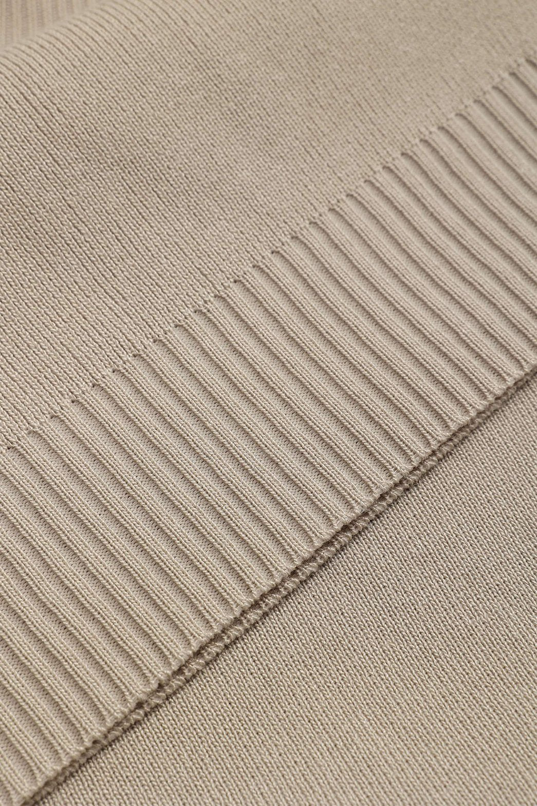 Ensemble cape et pantalon beige vue moderne calme