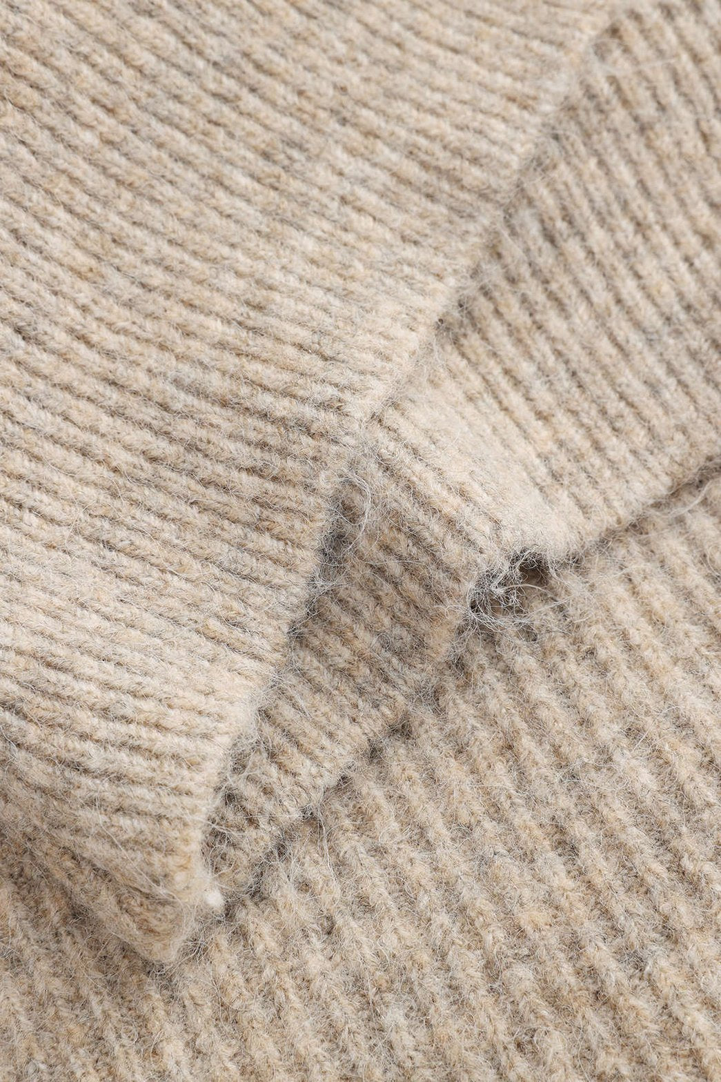 Détail finitions ensemble tricoté précieux