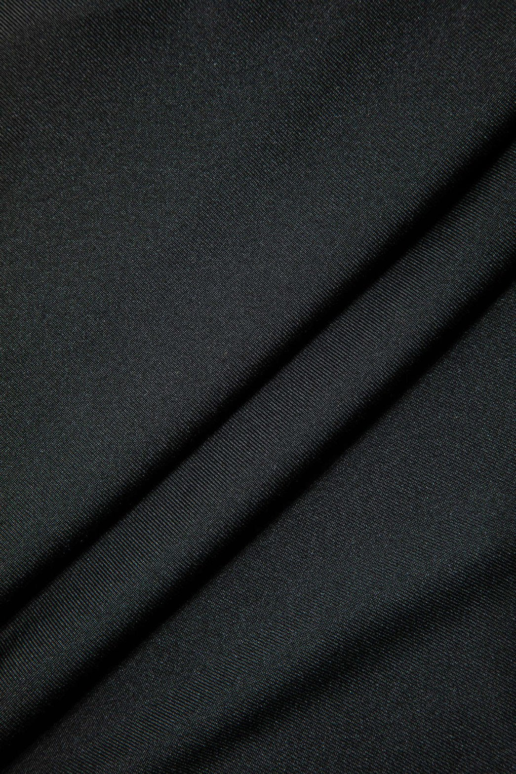 Ensemble top dos nu et jupe volantée détail jupe nuage