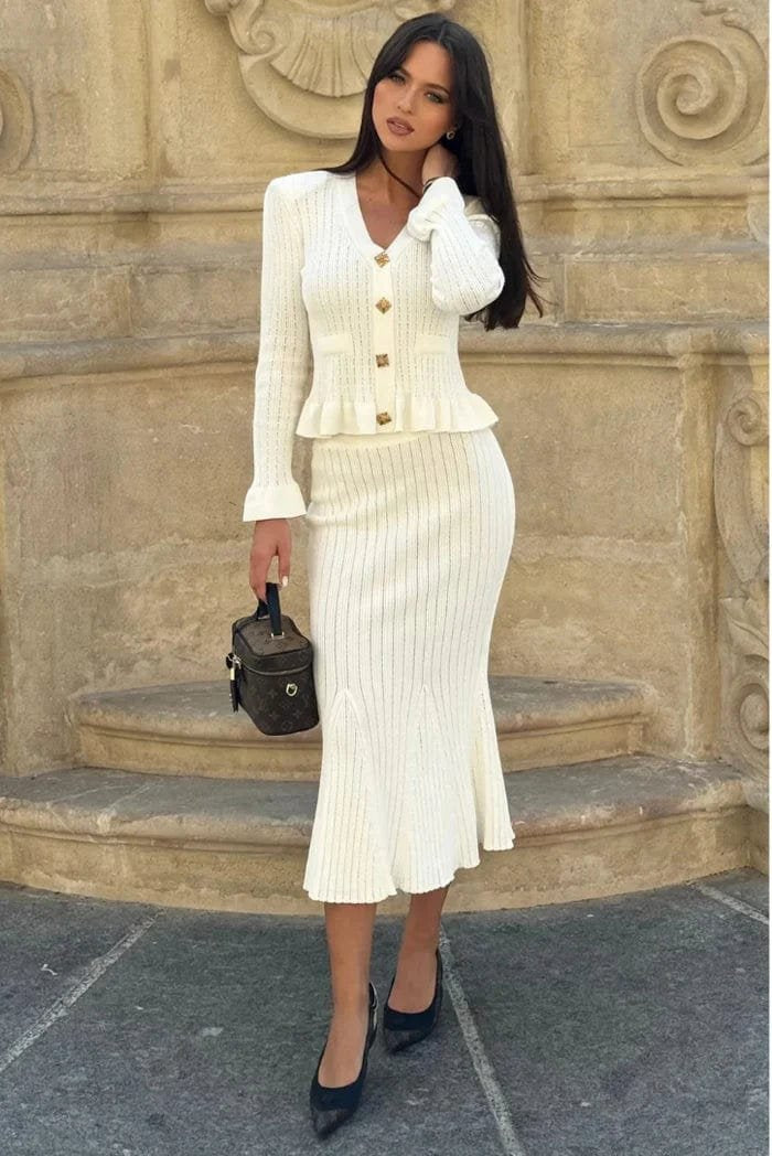 Tenue tricotée noire allure