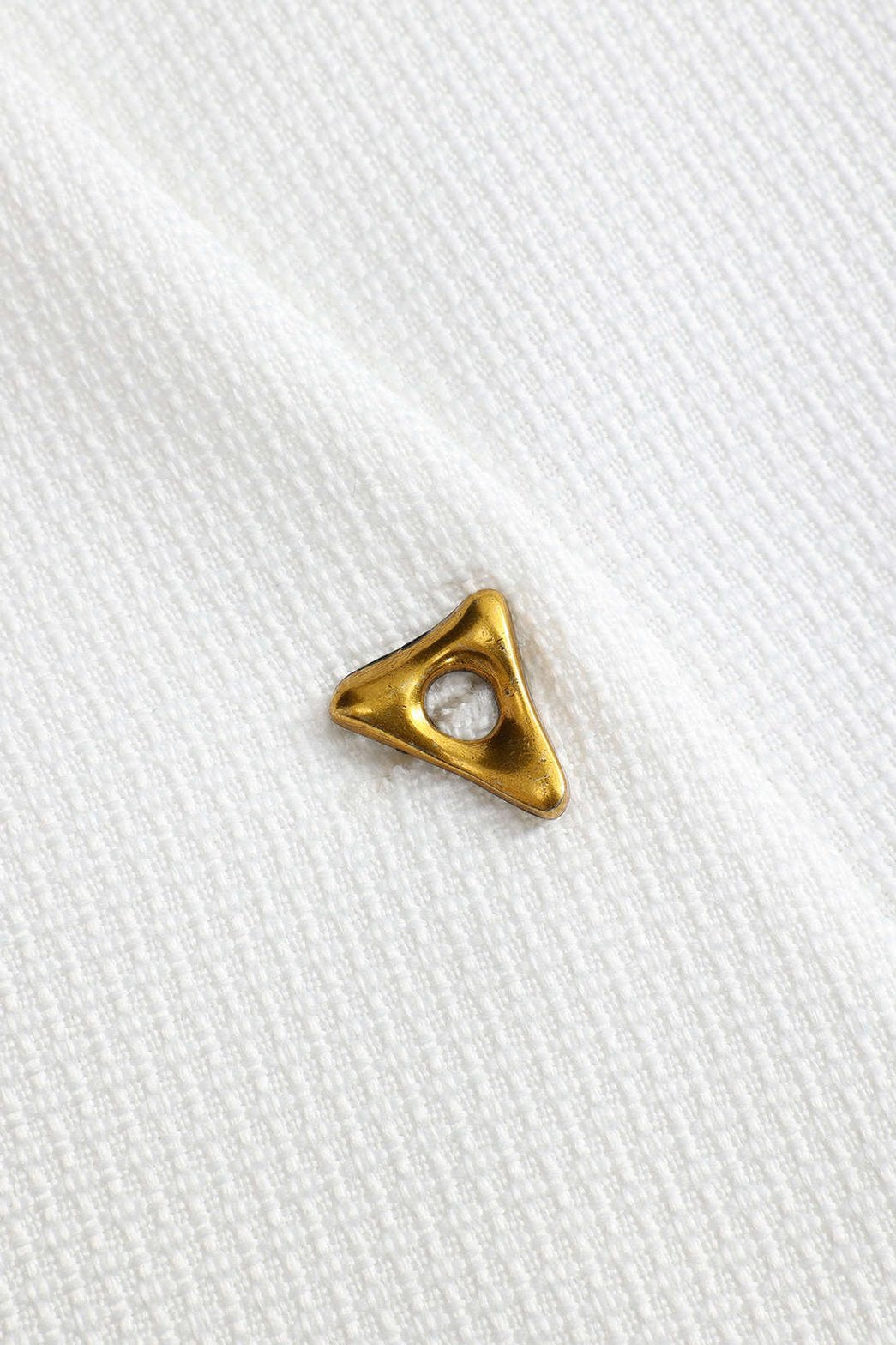 Gilet asymétrique métallisé détail nuage