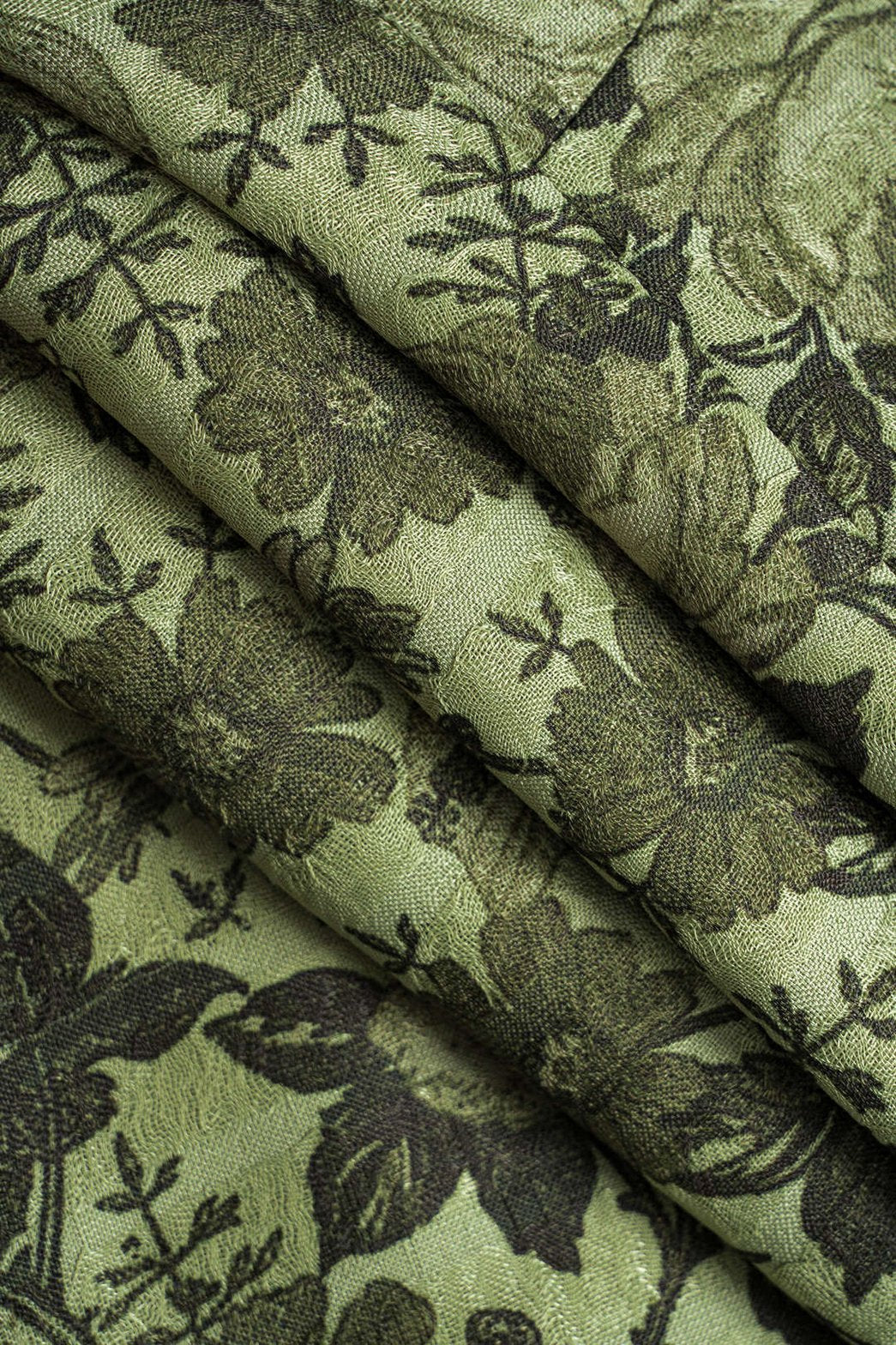 Vue de profil du gilet floral vert nuage