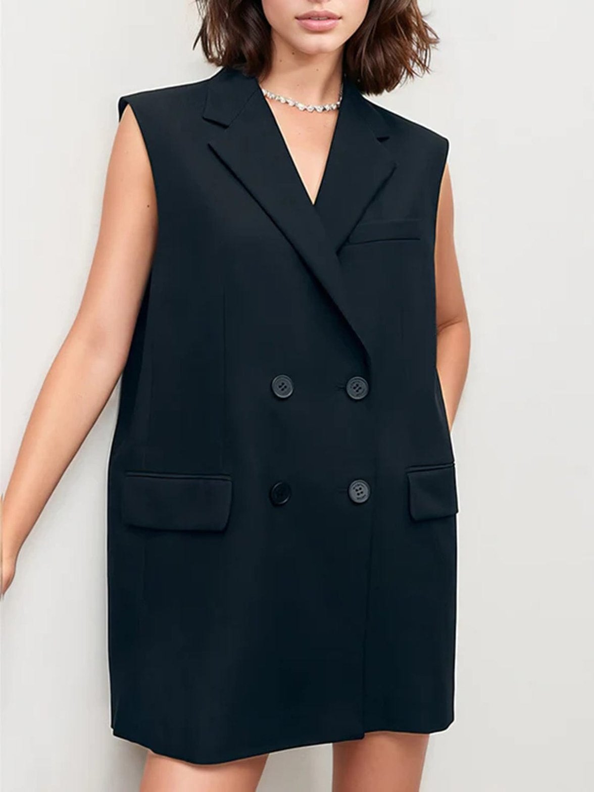 Gilet noir sans manches coupe droite soleil