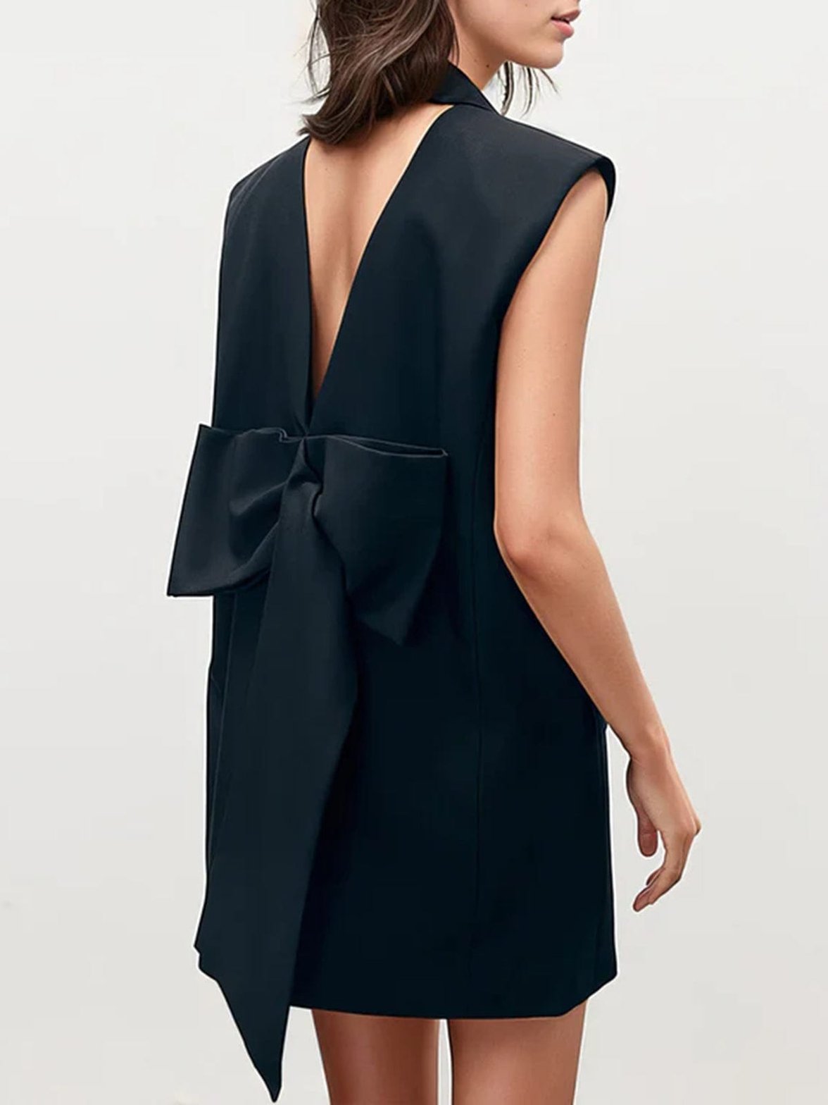 Gilet élégant noir avec nœud décoratif au dos étoile